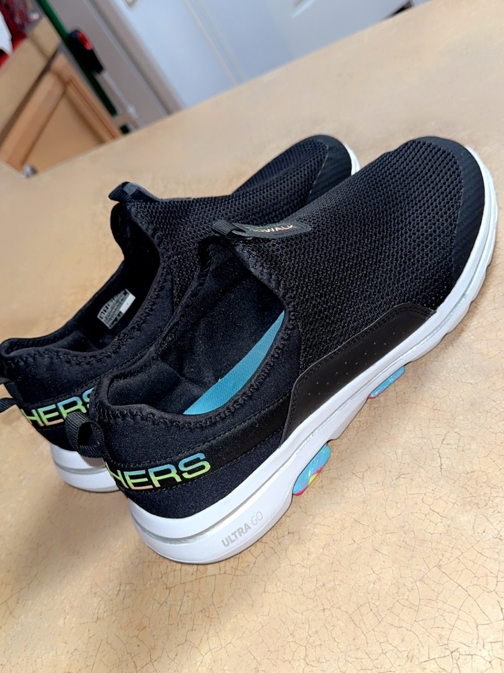 Skechers women  Black Slip-On Sneakers with Neon Green Logo
